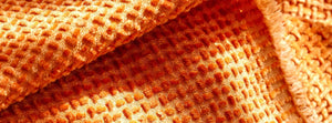 Coveri Caramel: close-up of the original throw fabric.
