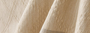 Diamora Cream White: close-up of the original throw fabric.