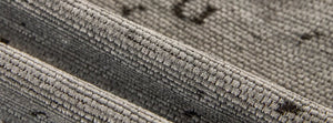 Elaris Cloud Grey: close-up of the original throw fabric.