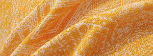 Melareve Golden Yellow: close-up of the original throw fabric.