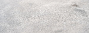 Mistara Cloud Grey throw fabric detail — AI-generated from product references.