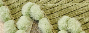 Pomelle Green: close-up of the original throw fabric.