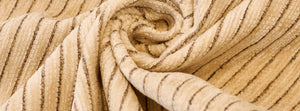 Pomelle Khaki: close-up of the original throw fabric.