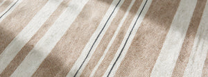 Striniara Khaki throw fabric detail — AI-generated from product references.