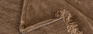 Velmora Milk Tea: close-up of the original throw fabric.