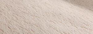 Velmora Cream White throw fabric detail — AI-generated from product references.