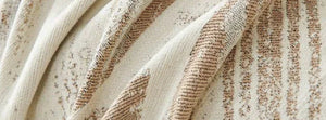 Yeluxe Beige: close-up of the original throw fabric.